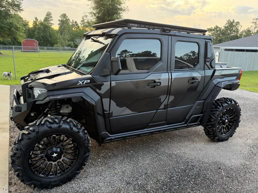 Side profile black gray camo Polaris Xpedition XP roof rack Rhino-Rack off-road tires gravel field Shane's 2025 Xpedition XP5 Compact Electric horn gallery photo 2