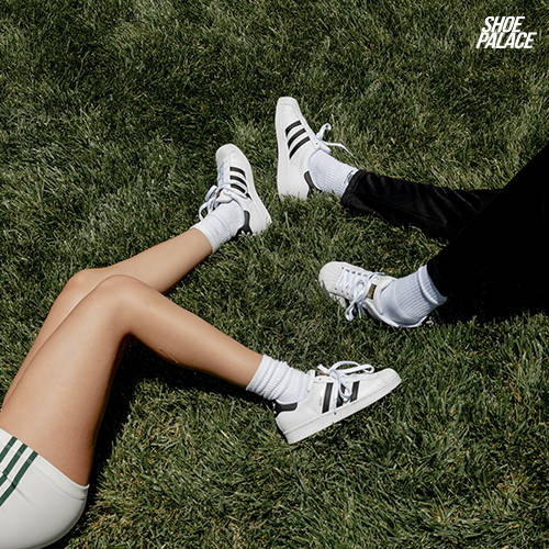 topview of female and male model weearing adidas superstars