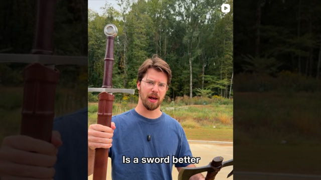 Person holding a sword, asking if it's a weird weapon.