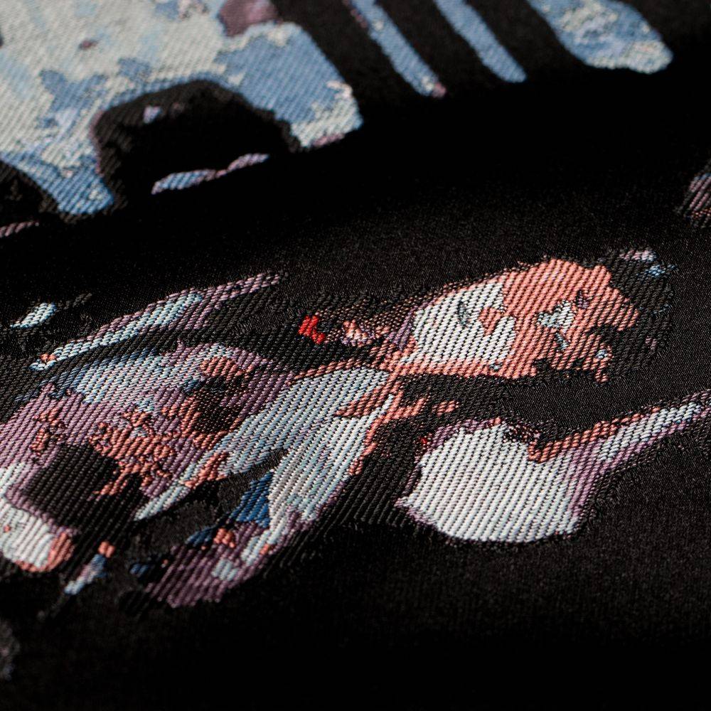 close up of graphic on tee