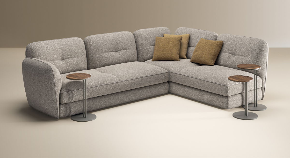 L-shaped grey Michael sofa by Cattelan Italia with two cushions and side tables.