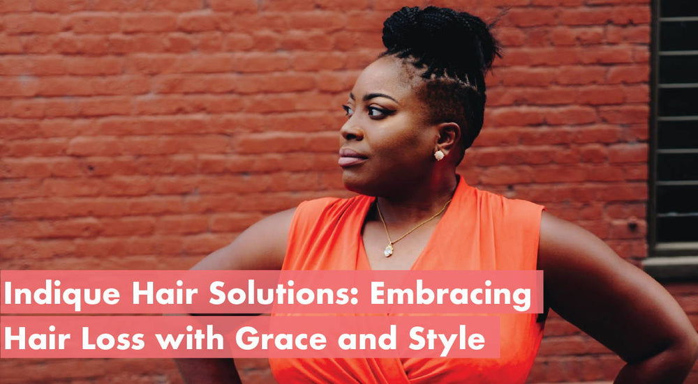Woman in orange shirt showcasing confidence against a brick wall background.