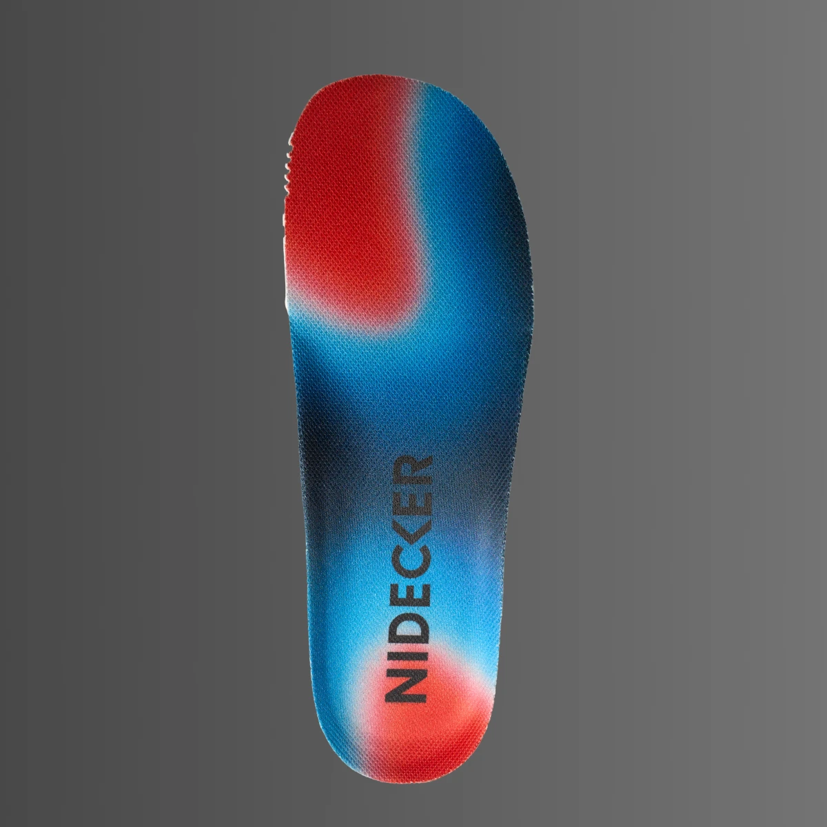 Shoe insole with Nidecker branding and a blue-red gradient design.