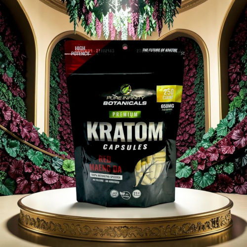 Kratom capsules package on a decorative pedestal surrounded by floral background.