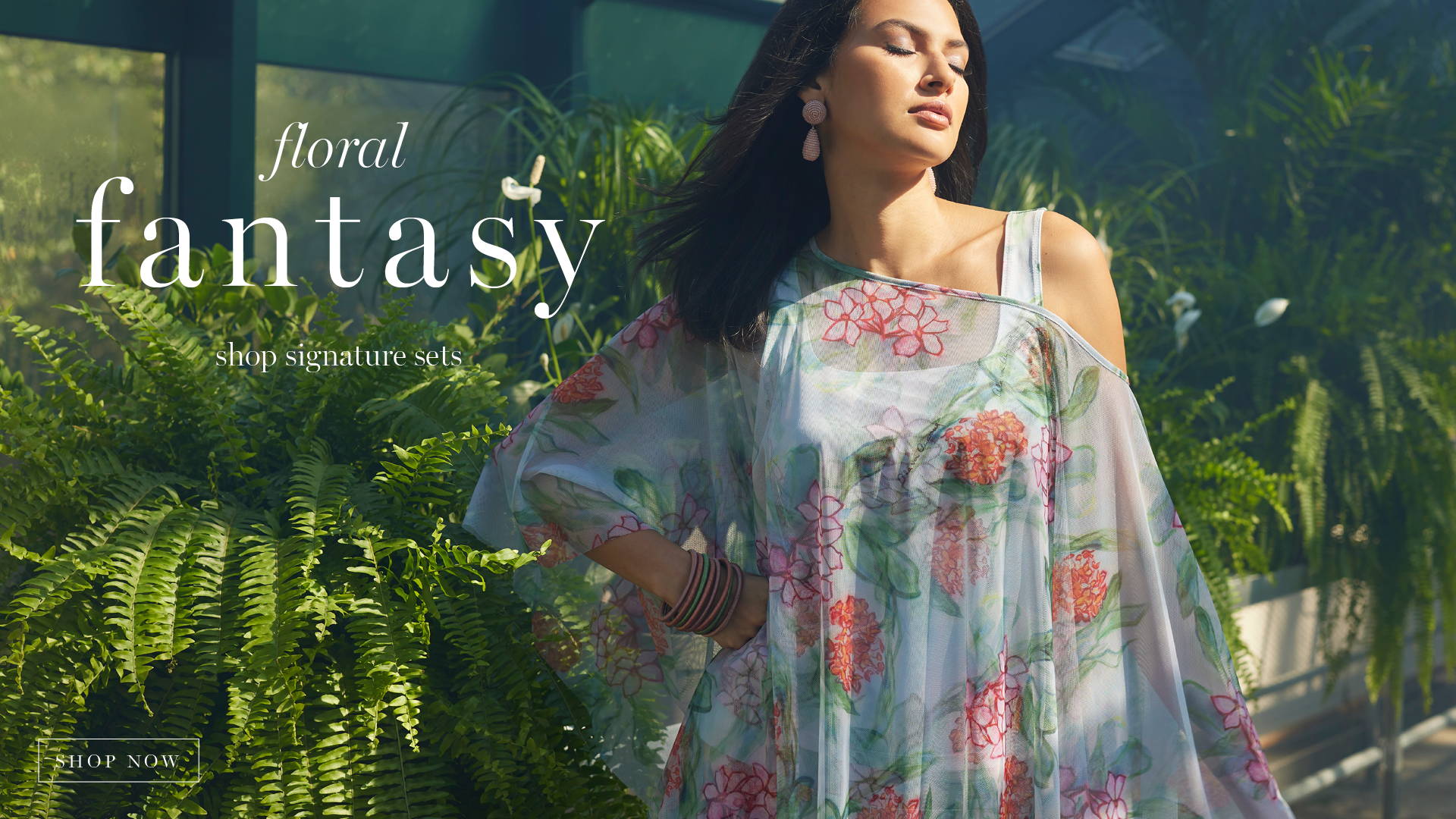 floral fantasy | Shop signature sets | Woman wearing floral mesh topper over tank top in a greenhouse for women's warm weather clothing