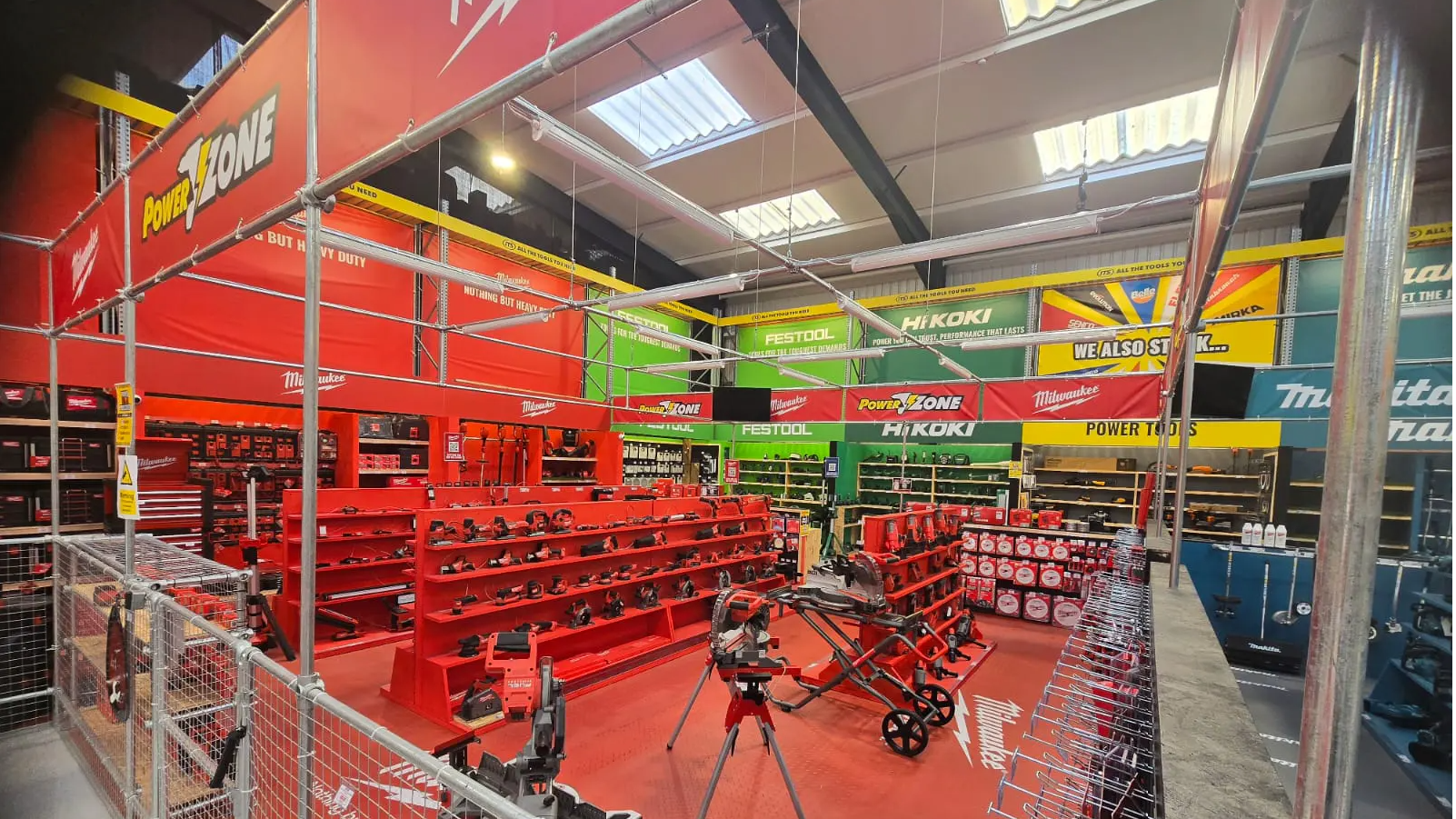 A brightly colored tool store interior with organized displays.