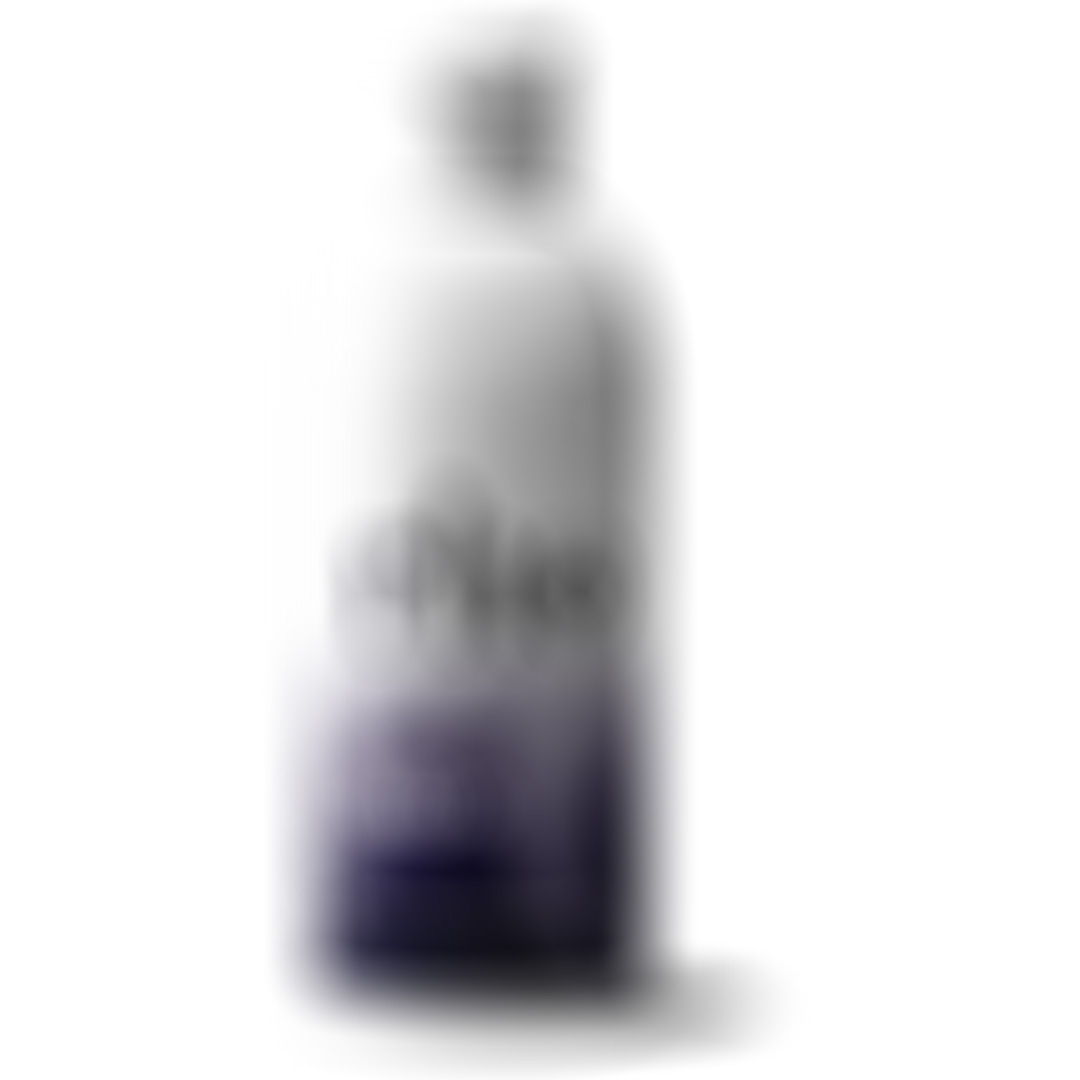 Blurry bottle with a gradient design and text on the label.