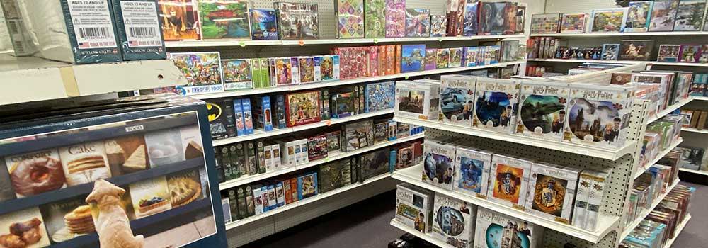 Herrschners Retail Store: image of Puzzles stocked on shelves