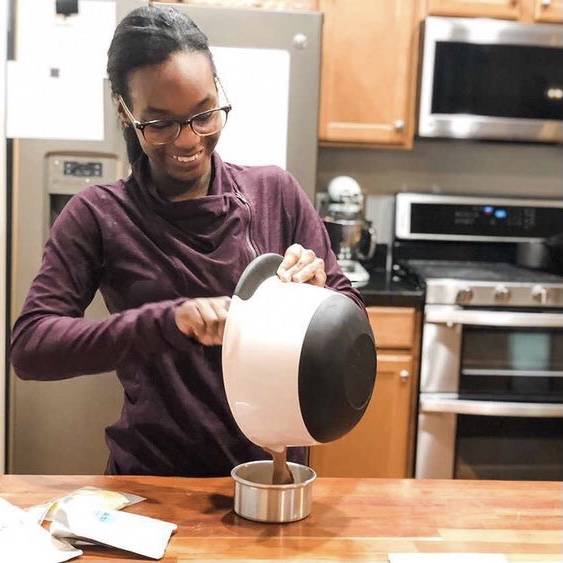 Teenager making a cake