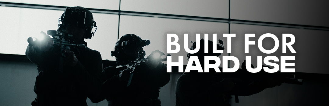 Silhouettes of armed figures with the text 