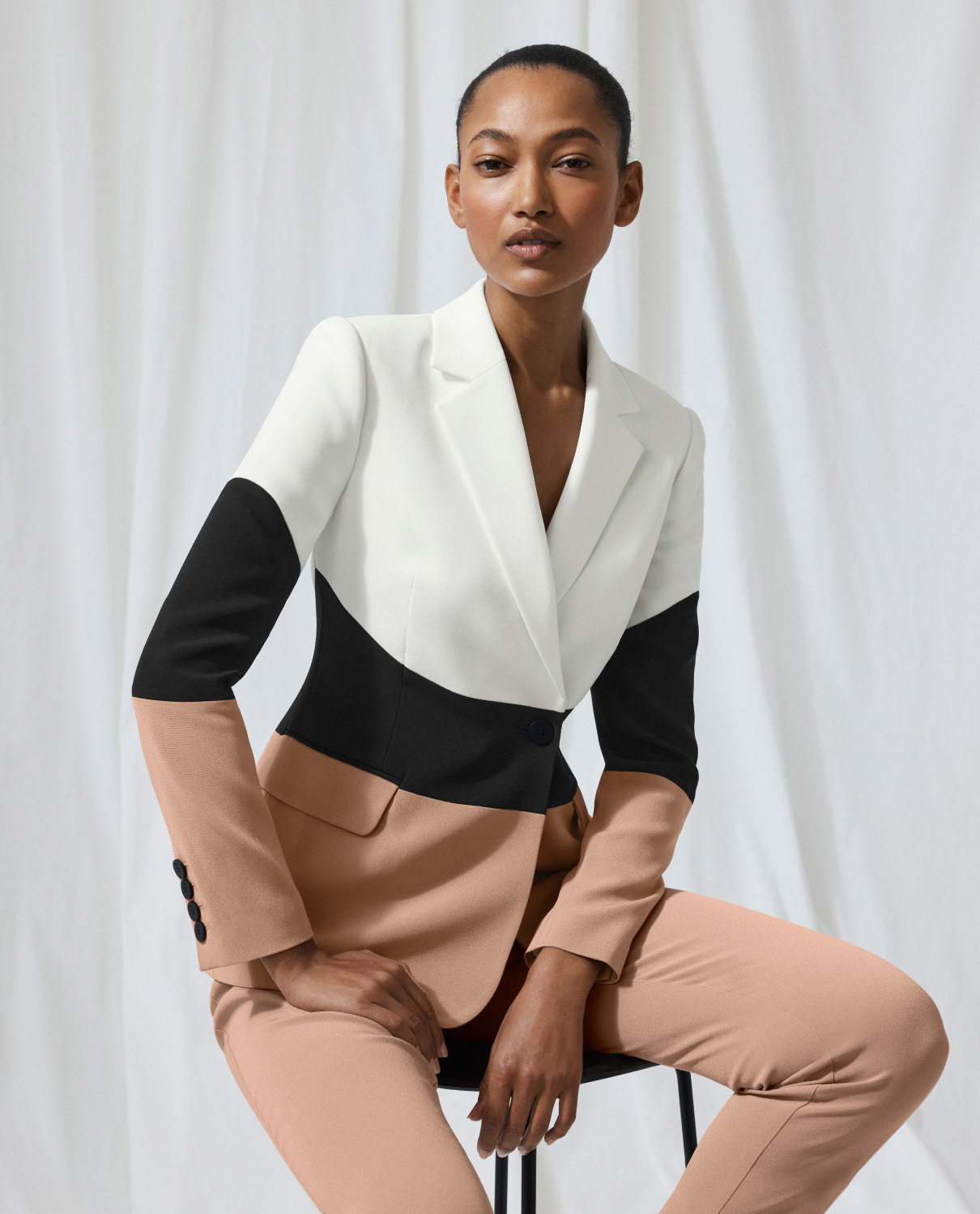 Model wearing fawn, black and ivory Knighton Clever Crepe jacket