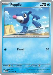 Popplio, a blue aquatic Pokémon, playing in the water.