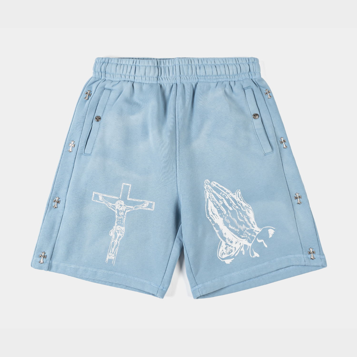 Light blue shorts with decorative religious graphics.