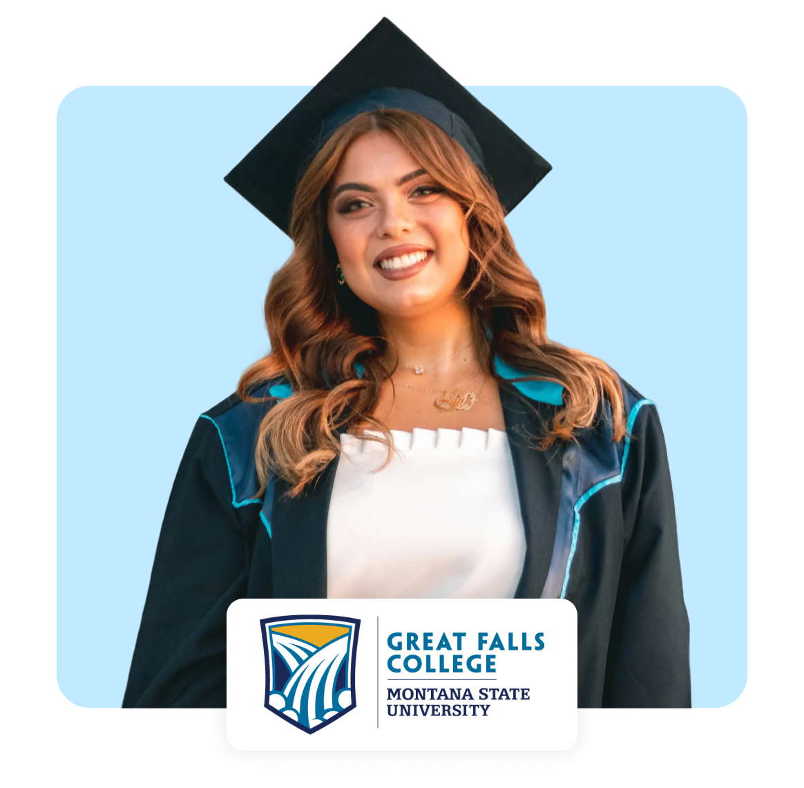 Young woman in graduation cap and gown smiling against a blue background.