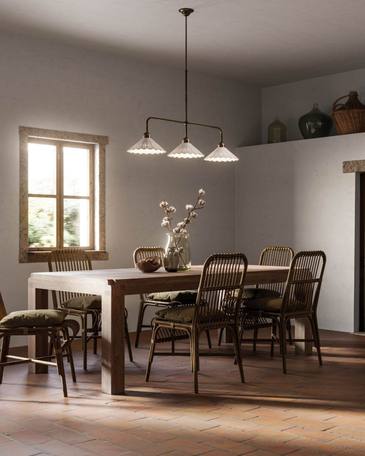 A stylish dining room with a large table, chairs, and natural light.
