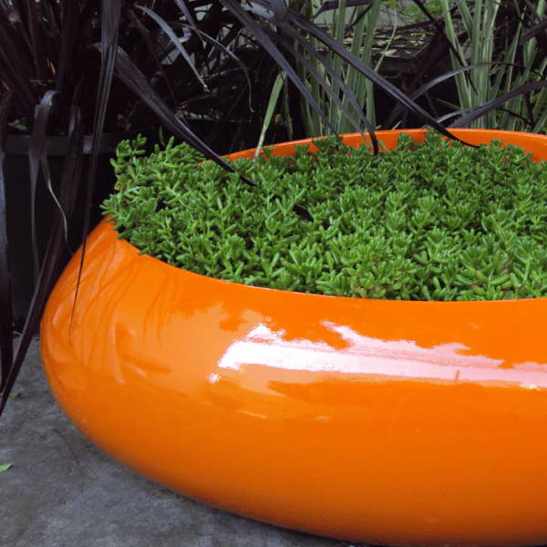 fiberglass orange oval pebble planter