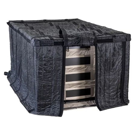 Sound dampening cover fitted over a Faraday tent