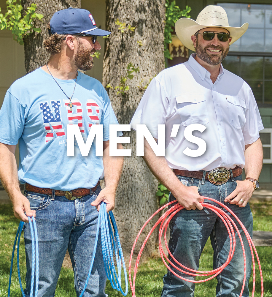 Two men holding ropes outdoors, wearing casual attire and hats.