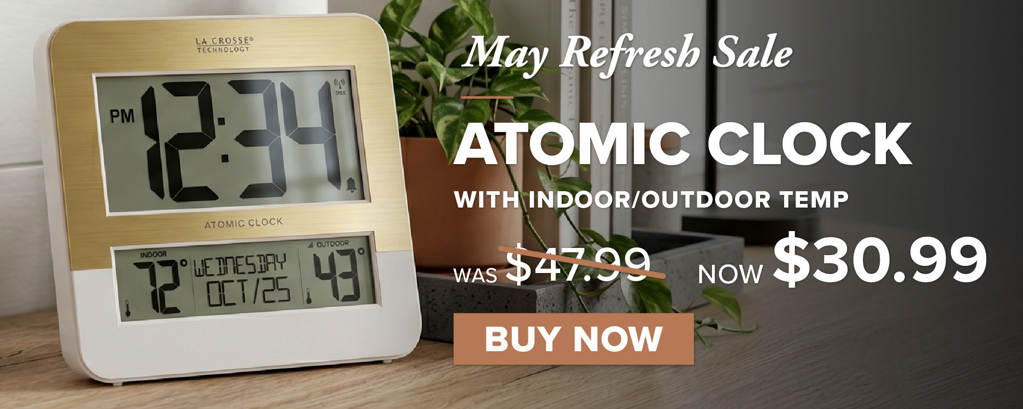 Atomic clock with indoor/outdoor temperature and sale price information.