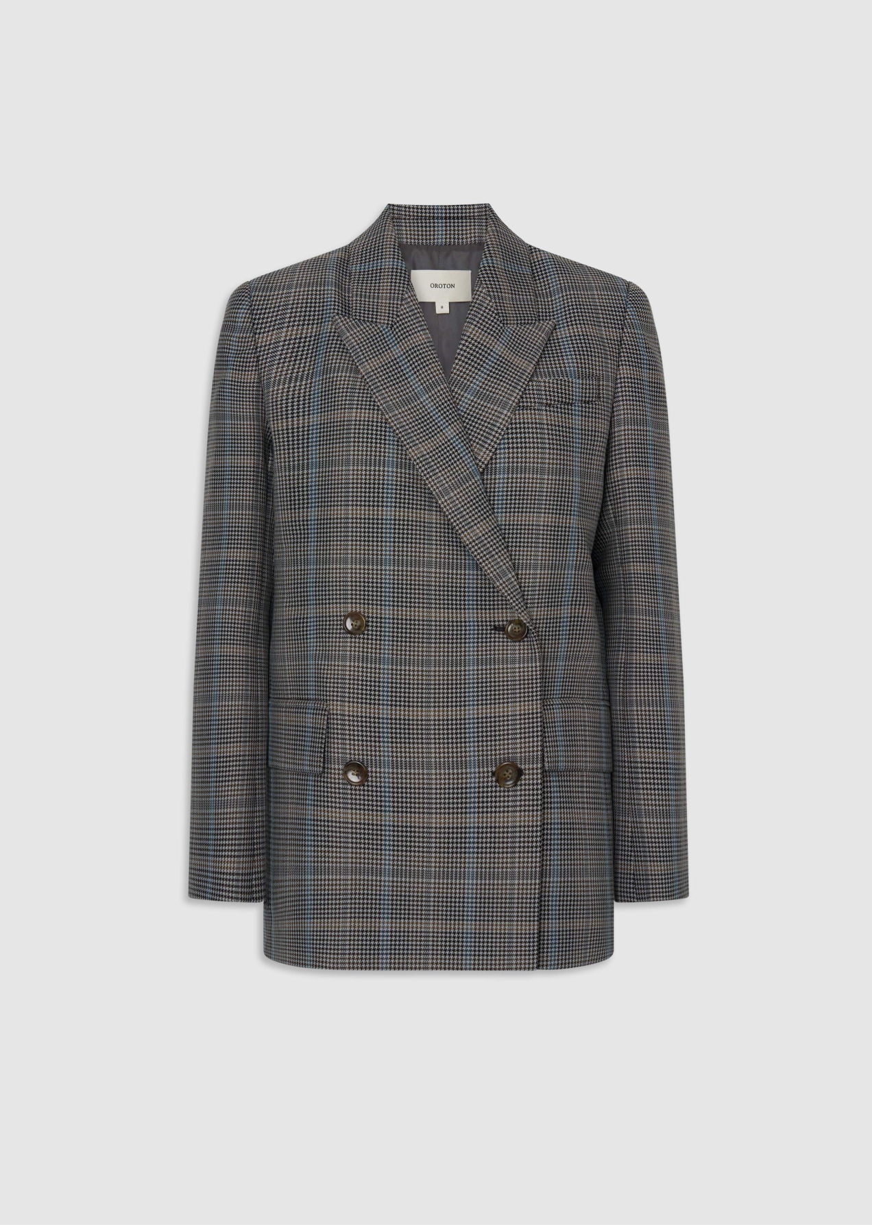Double-breasted plaid blazer in gray and blue tones.
