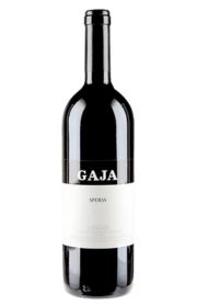 A bottle of Gaja wine with a black label.