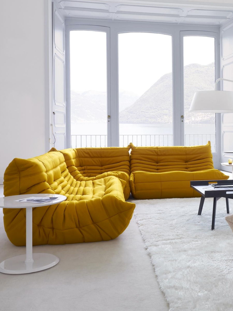 Tall image of the Togo Sofa in yellow by Michel Ducaroy for Ligne Roset