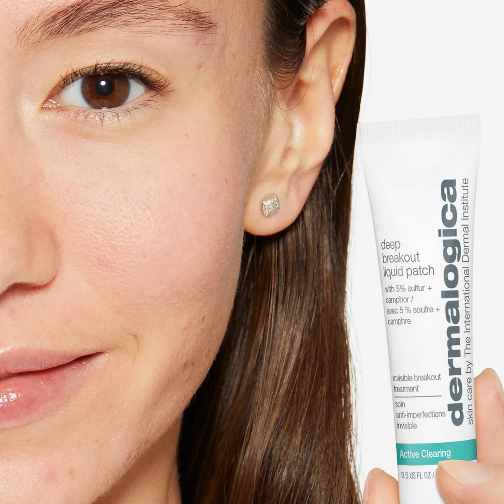 Model holding the New Dermalogica Deep Breakout Liquid Patch