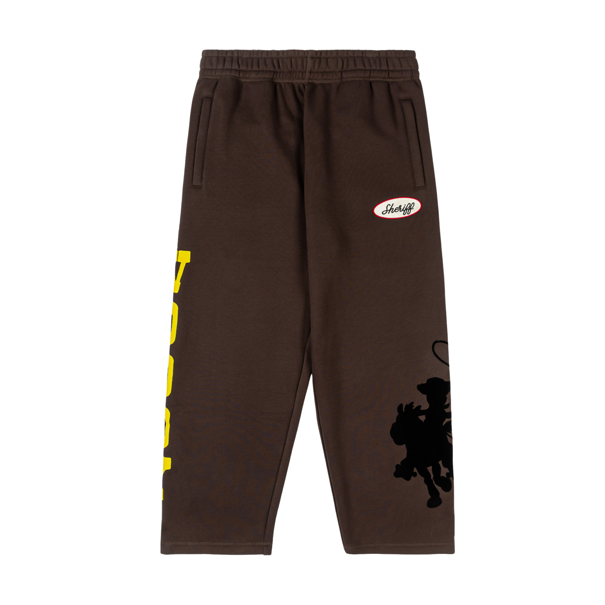 Brown sweatpants with yellow text and a black graphic design.