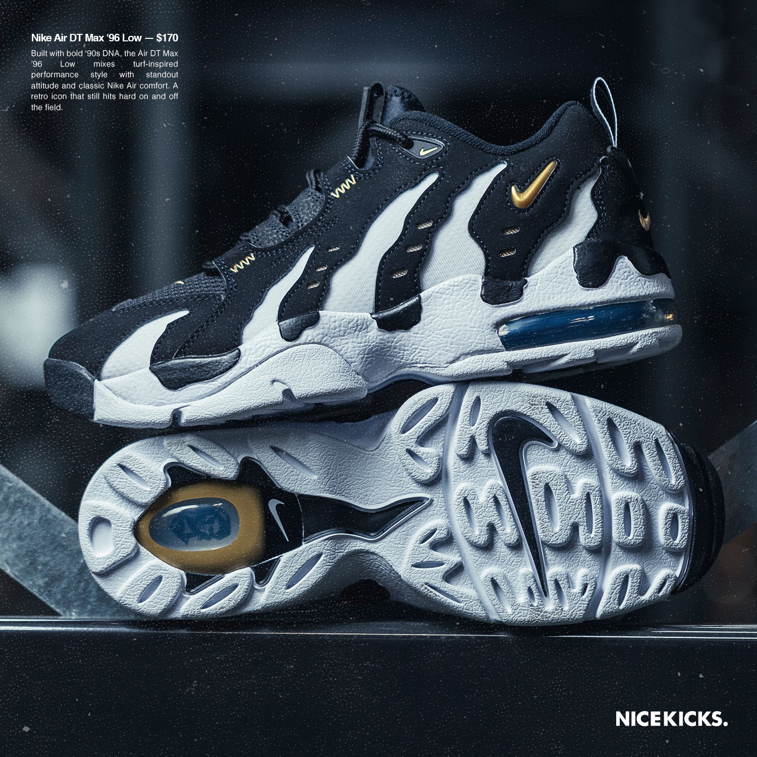 Black and white Nike sneakers displayed on a reflective surface.