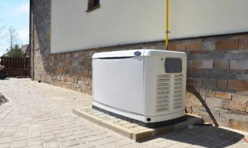white metal generator box with exhaust vents
