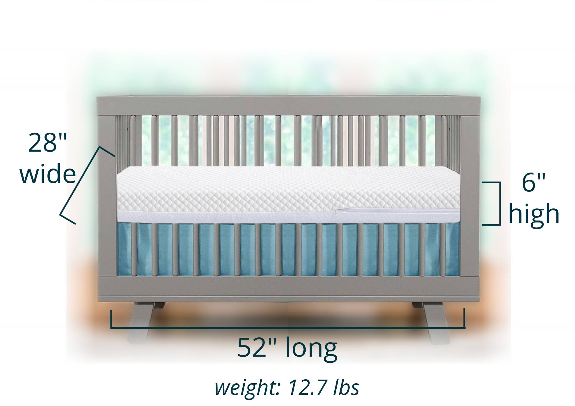 Yeti crib mattress in a crib showing dimensions of 28
