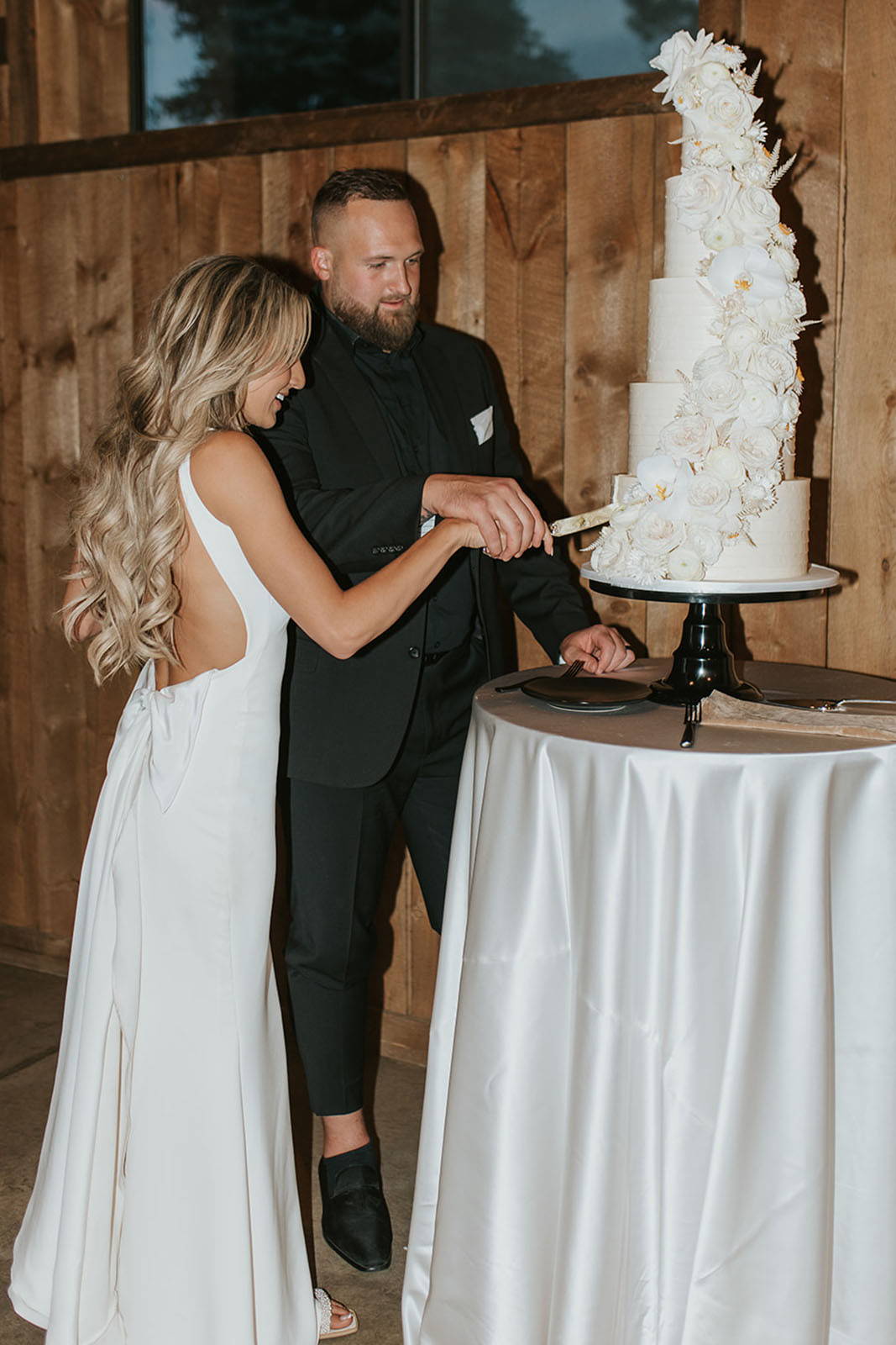 Bride and Groom cutting the cake