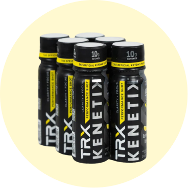 A pack of TRX KENETIK Ketone Shots in black bottles.