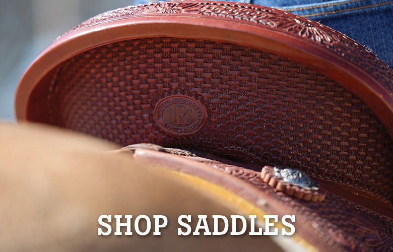 A close-up of a saddle with the text 