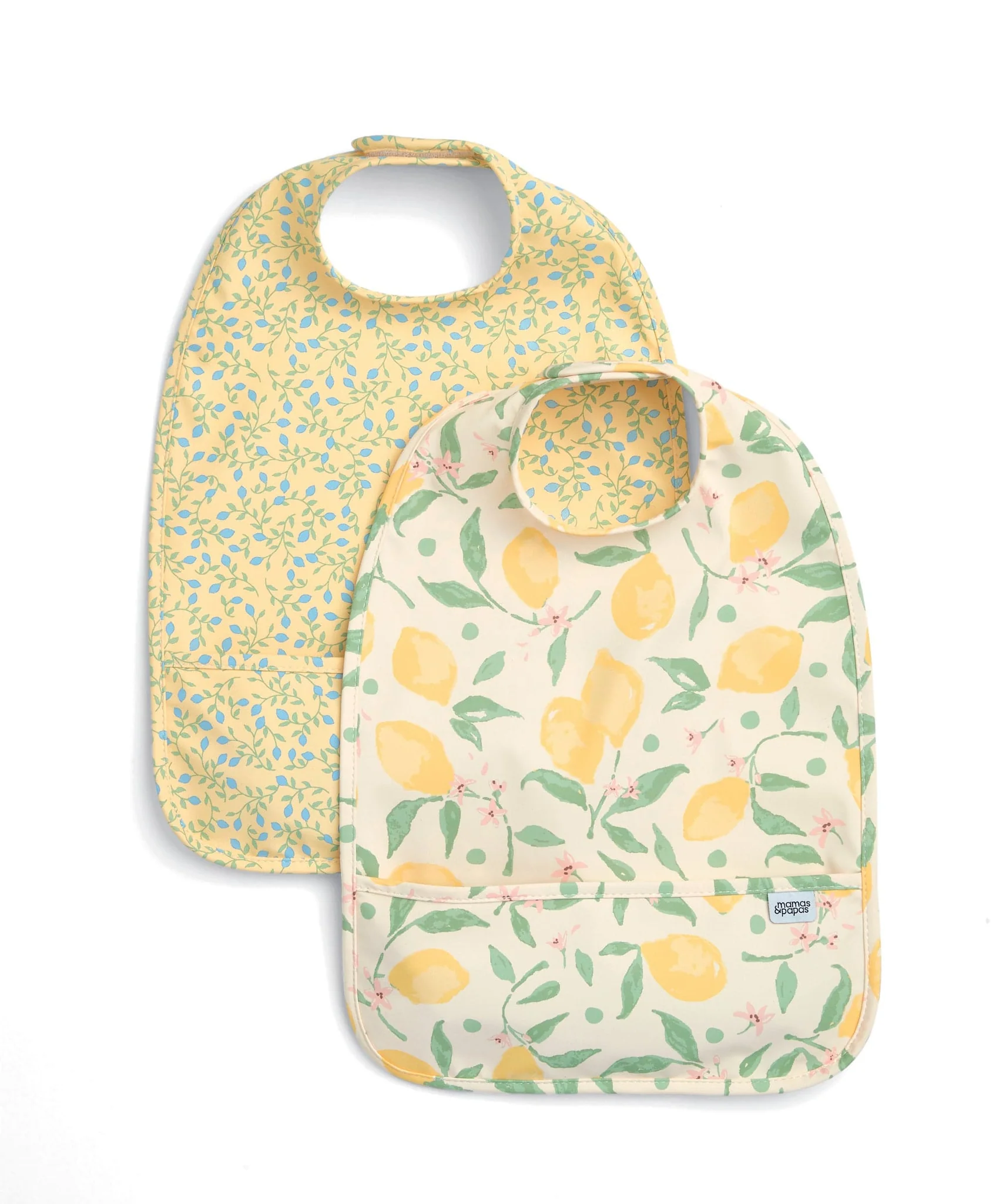 Two baby bibs with floral and lemon patterns.