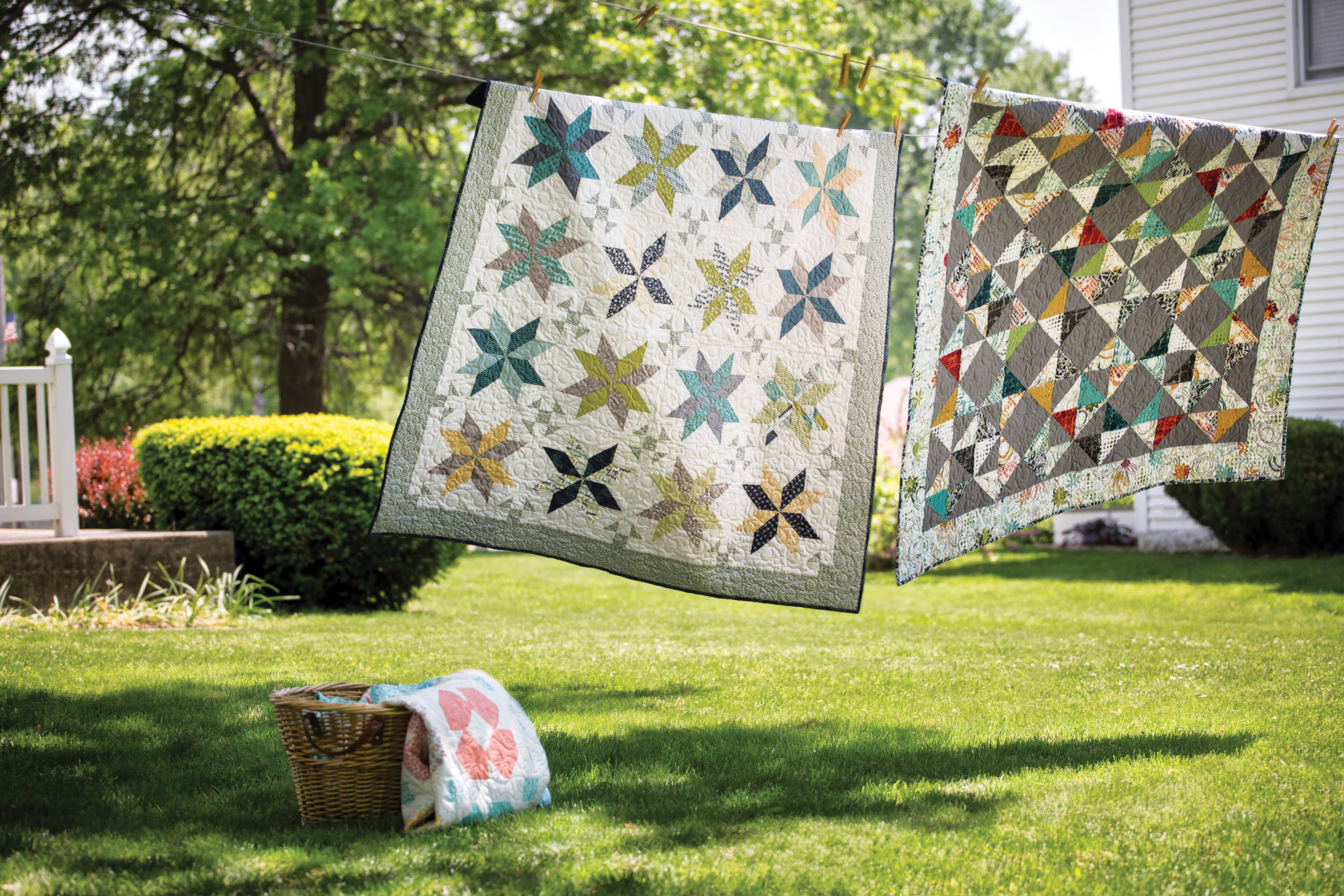 airing quilts on a clothes line