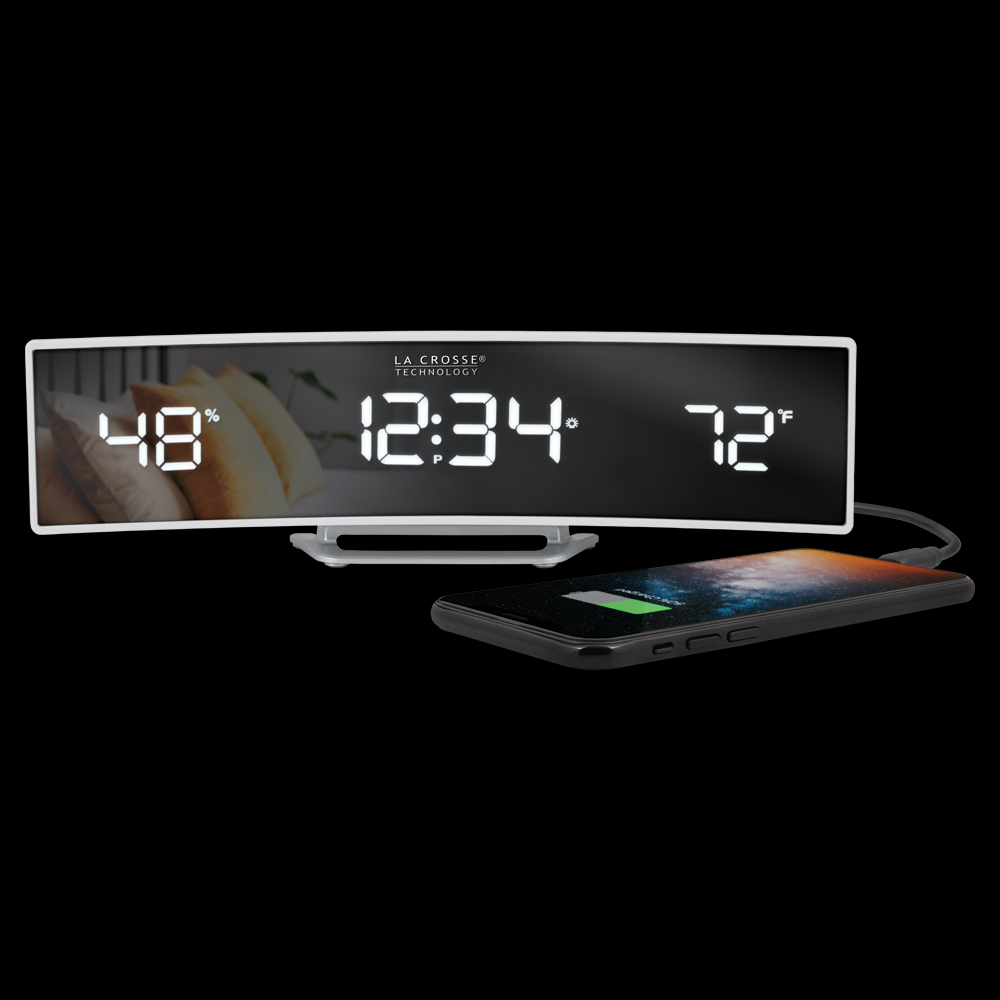 602-247v2 Digital clock and temperature display with a smartphone charging.