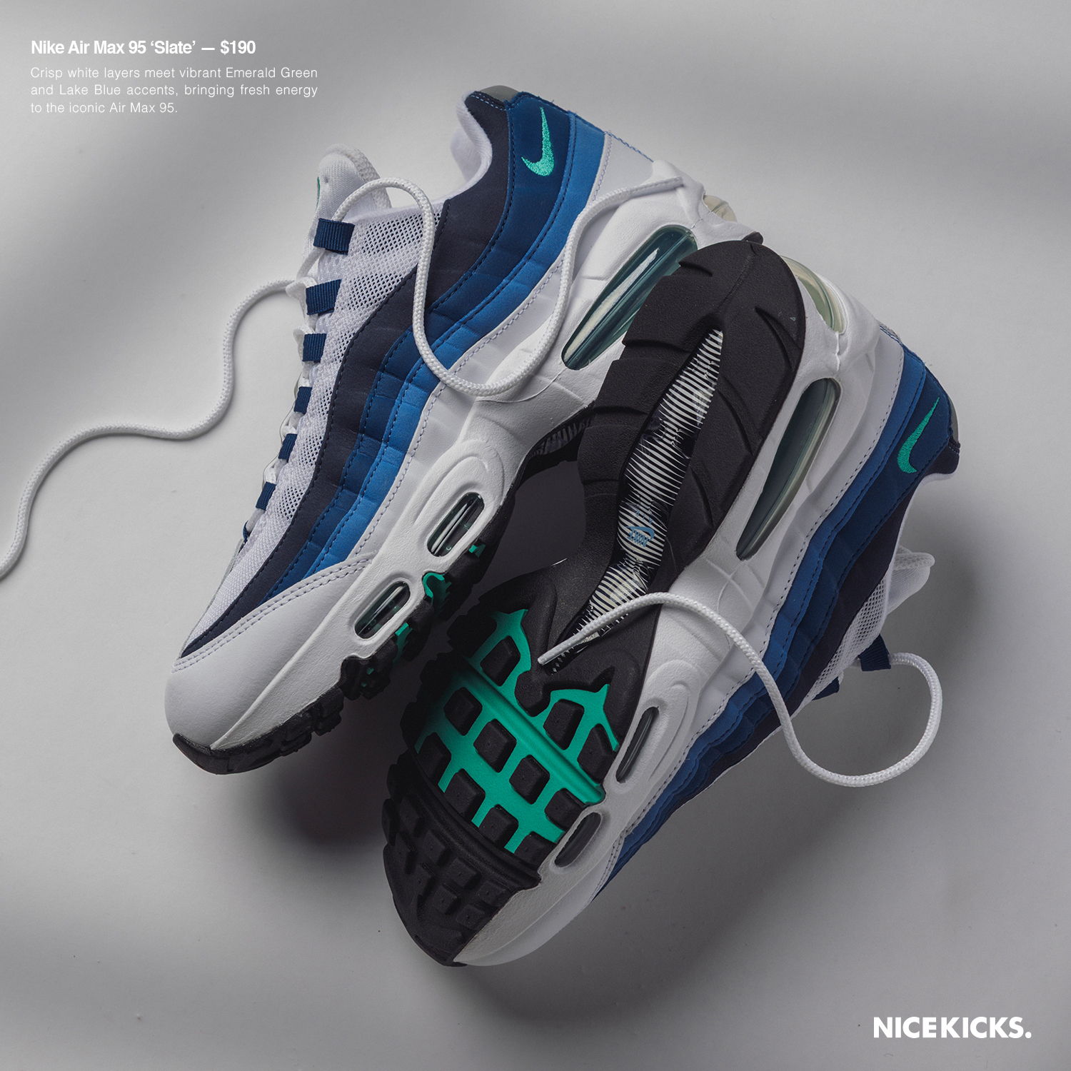 Nike Air Max sneakers in white, blue, and black on a gray background.