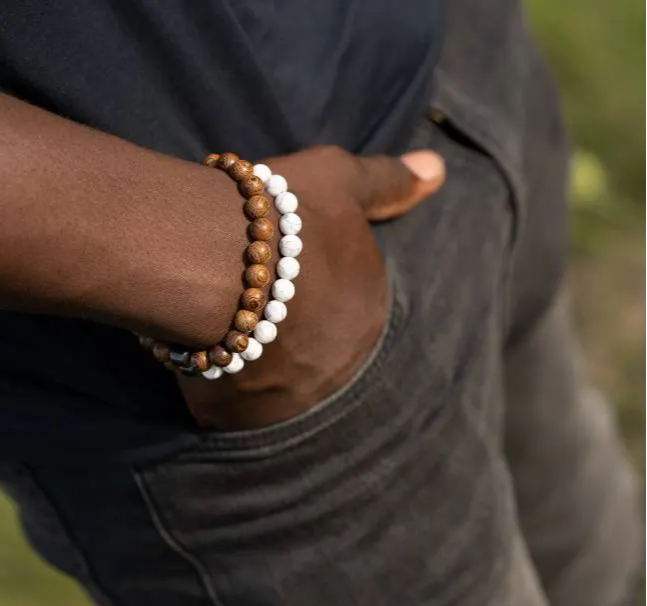 a man wearing a wooden bracelet
