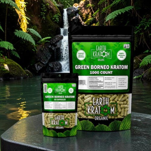 Three packages of Green Borneo Kratom in a natural setting.