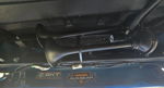 Dual black air horns mounted under chassis with SKT Customs and Auxbeam branding