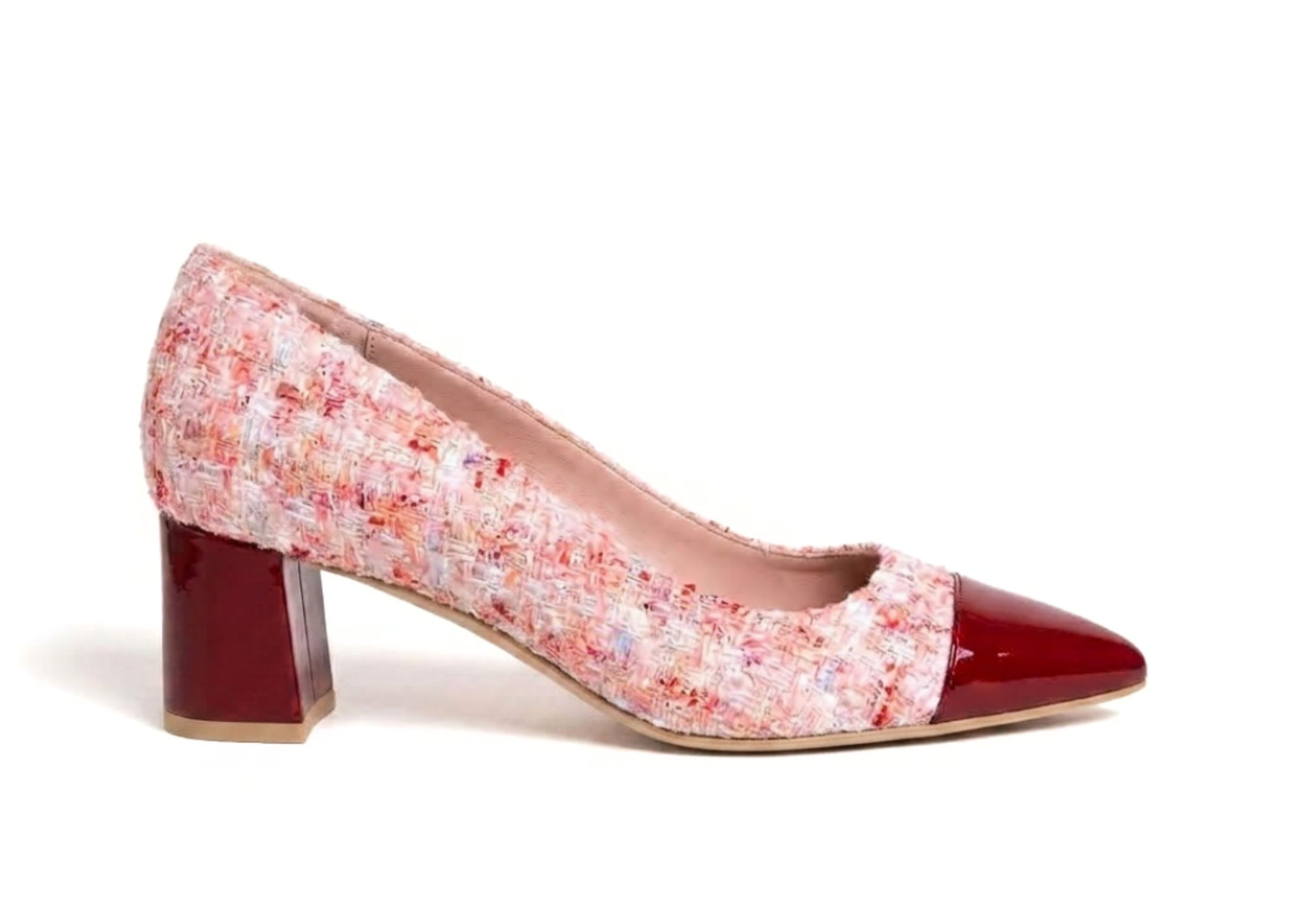 Pink floral high-heeled shoe with a red toe cap and block heel.