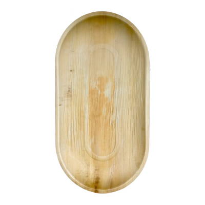 A curved rectangular palm leaf tray