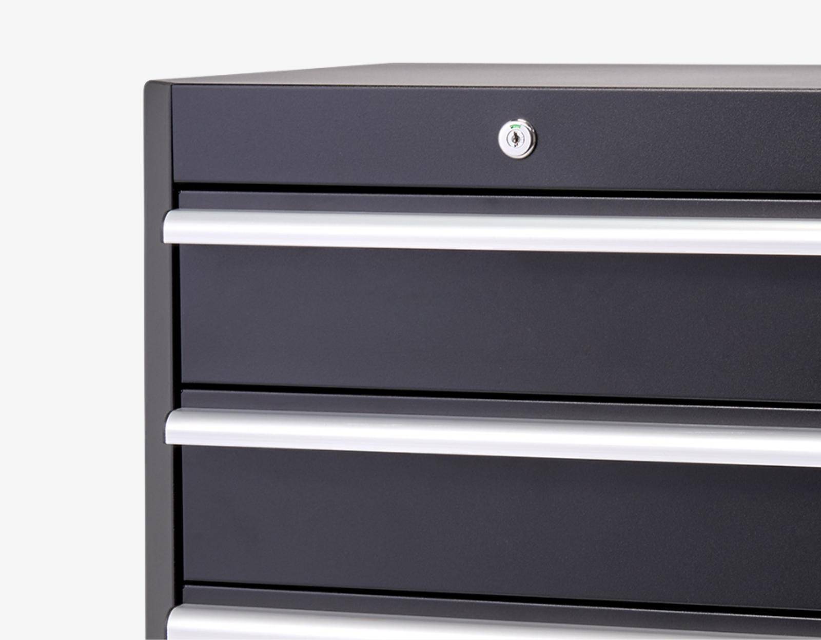 rounded edges of the base cabinet, aluminum drawer handles