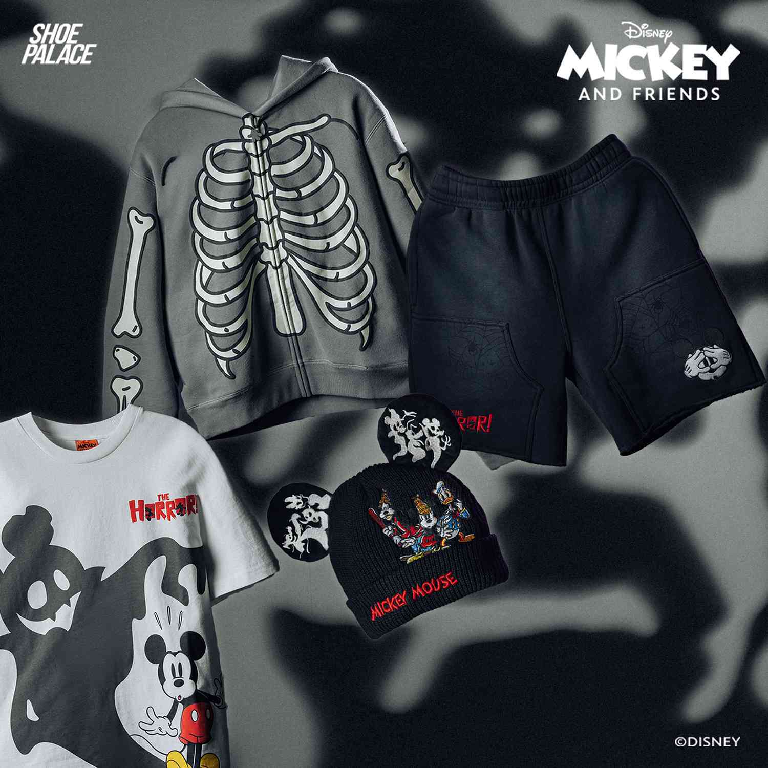 Disney Mickey and Friends themed clothing including a hoodie, shorts, and beanie.