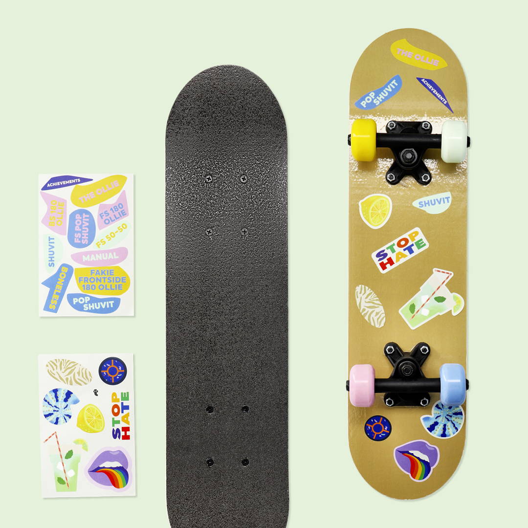 A skateboard with colorful wheels and stickers, placed next to a black grip tape skateboard with achievement stickers