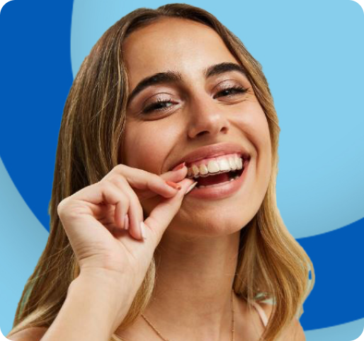 happy woman showing her teeth appliance from spot pal