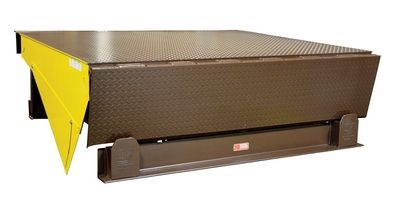 Brown industrial dock leveler with a yellow safety edge.