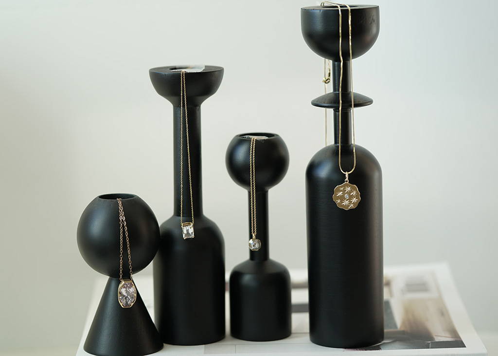 a collection of gold necklaces