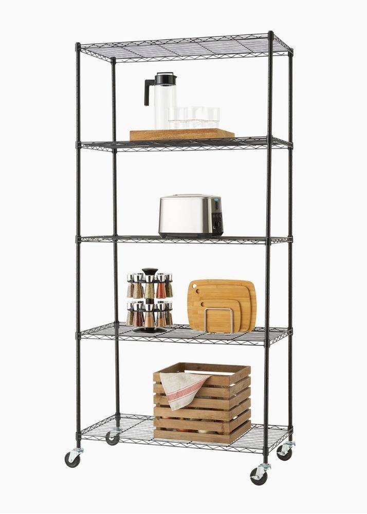 black wire shelving rack with 5 shelves, filled with kitchen pantry items